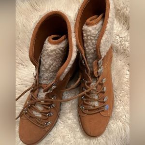 Side and Sherpa lace-up hiking boots.